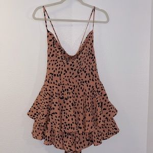 Black and peach ruffled romper